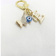 Biuti Metal Kelebek E Harfi Turkuaz Cam Nazar Boncuklu Klipsli Cüzdan Çanta Süsü Charm Gold Renkli
