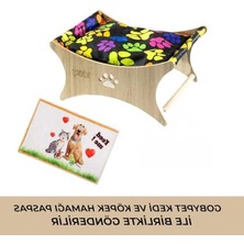Odea Ahşap Kedi Hamağı, Minderli ve Sallanabilir Tasarımıyla Konforlu Bir Dinlenme Alanı Yaratır.