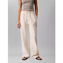 Calvin Klein Kadın Rahat Kesim Ck Logo Işlemeli Geniş Paça Ekru Eşofman Altı LV047G822G-YAS