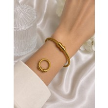 Bymiel Gold Burgu Çelik Kelepçe Bileklik – Minimal Modern Kadın Bileklik