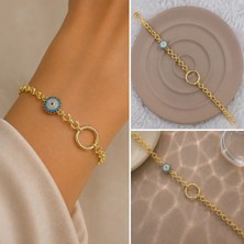 Fm 💎 Premium Parlak ve Şık Gold  Renk Nazar Boncuklu Yuvarlak Detaylı 316L Çelik Kadın Bileklik (22cm)