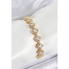 Inure Jewelry Pirinç Zirkon Taşlı Yonca Baget Model Gold Renk VIP Seri Kadın Bileklik