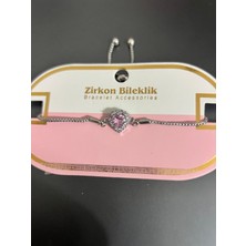Zirkon 💗 Pembe Kalp Taşlı Asansörlü Çelik Bileklik – Zarif ve Şık Tasarım