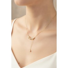 N&M Store Pirinç Gold Renk Minimal Sallantılı Yıldız Model Kadın Kolye