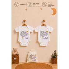 Pia Baby Isimli Kız Bebek Hediye Seti 2 Adet %100 Pamuk Organik Baskılı Çıtçıtlı Body Zıbın ve Ham Bez Kıyafet Kesesi