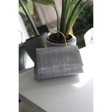 Moom Bag Kadın Platin Lazer Kesim Metal Tutma Saplı Kapaklı Abiye Çantası