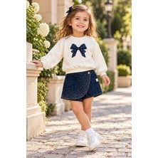Beniizle Kız Çocuk Fiyonk Detaylı Sweatshirt ve Taşlı Denim Şort Etek 2’li Takım