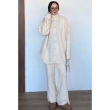 Düşük Omuzlu Dikey Fitilli Oversize Triko Hırka ve Bol Paça Pantolon Takım