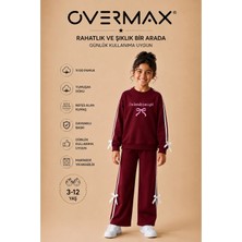 Overmax Kız Çocuk Şerit ve Fiyonk Detaylı Just A Girl Baskılı Eşofman Takımı – 3-12 Yaş