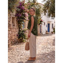 Meltem Collection Sırtı Düğme Detaylı Kolları Fırfırlı Müslin Bluz