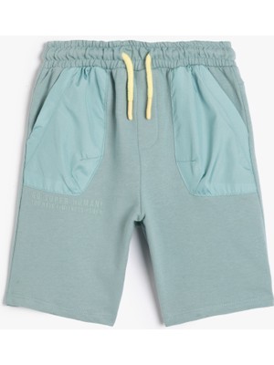 Koton Çocuk Şort Beli Bağlamalı Cepli Pamuklu Paraşüt Kumaş Detaylı