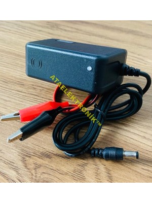 Ata Elektronik Pilsan Uyumlu Çocuk Oyuncak 12 Volt Aküler Için Şarj Aleti Cihazı Adaptör + Otomatik Voltaj Kesicili +  LED Işıklı ( Şarjda Kırmızı - Dolduğunda Yeşil ) + Extra Maşalı Kablolu +  1 Amper  - 13.8 Volt