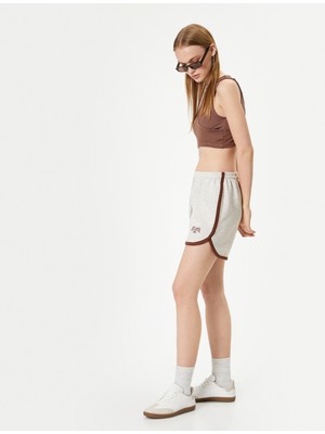 Koton Kadın Mini Şort Beli Bağlamalı Baskı Detaylı Yazlık Rahat Kesim ile Şıklık