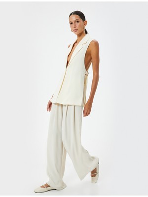 Koton Uzun Yelek Yanları Yırtmaçlı Kemer Detaylı Kruvaze Ters Ceket Yaka