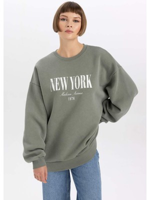 DeFacto Relax Fit Bisiklet Yaka Baskılı Yıkamalı Soluk Efektli Sweatshirt B6595AX23WN