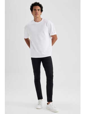 DeFacto Carlo Skinny Fit Ekstra Dar Kalıp Normal Bel Ekstra Dar Paça Jean Pantolon R8763AZ23SP