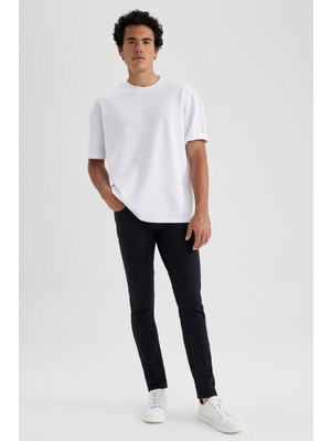 DeFacto Carlo Skinny Fit Ekstra Dar Kalıp Normal Bel Ekstra Dar Paça Jean Pantolon R8763AZ23SP