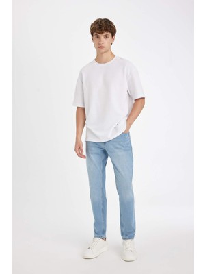 DeFacto Slim Tapered Fit Dar Kalıp Normal Bel Daralan Paça Jean Pantolon C4220AX24AU