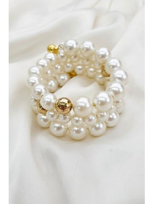 Mediterian İnci ve altın detaylı şık top tasarım bileklik, zarif ve parlak aksesuar.