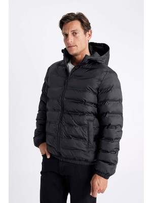 DeFacto Su İtici Rüzgar Geçirmez Slim Fit Dar Kesim Astarlı Kapüşonlu Fermuarlı Cepli Kışlık Şişme Mont D1185AX24WN
