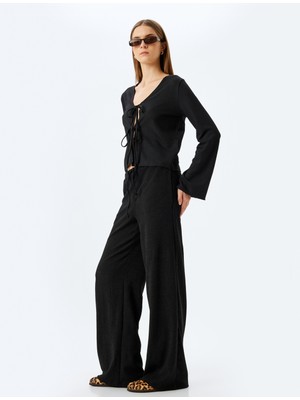 Koton Dokulu Beli Lastikli Bol Paça Pantolon