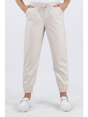 Beli ve Paçası Lastikli Cepli Deri Görünümlü Kız Çocuk Pantolon