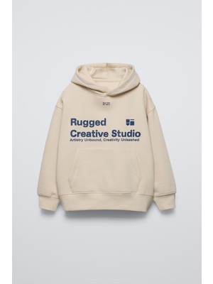 The Champ Clothing Bej Çocuk Rugged Creative Stüdyo Baskılı Oversize Kapüşonlu Kanguru Cepli Sweatshirt