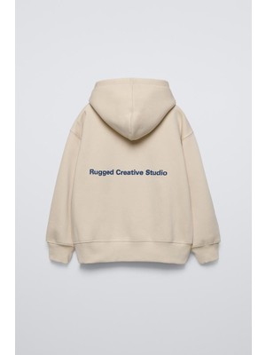 The Champ Clothing Bej Çocuk Rugged Creative Stüdyo Baskılı Oversize Kapüşonlu Kanguru Cepli Sweatshirt