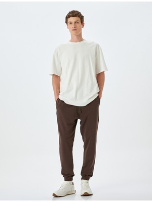 Koton Pamuk Karışımlı Paçası Lastikli Cep Detaylı Beli Bağcıklı Eşofman Altı