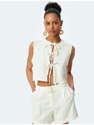 Koton Pamuklu Önden Bağlamalı Fiyonklu Bisiklet Yaka Crop Yelek