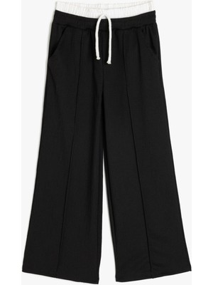 Koton Cepli Beli Lastikli Basic Pantolon Kız Çocuk İçin Polyester Karışımlı Günlük Model