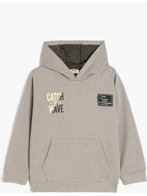 Koton Pamuklu Kapşonlu Uzun Kollu Slogan Baskılı Oversize Sweatshirt