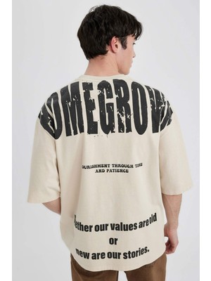 DeFacto Loose Fit Bisiklet Yaka Sırt Baskılı Kısa Kollu Tişört B8494AX24SM