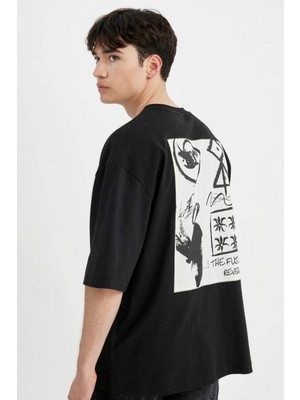 DeFacto Loose Fit Bisiklet Yaka Sırt Baskılı Kısa Kollu Tişört C1868AX24SM