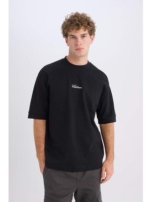 DeFacto Loose Fit Bisiklet Yaka Baskılı Ağır Kumaş Kısa Kollu Tişört D5496AX25SP