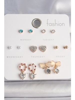 Stillove Pirinç Gold Renk Zirkon Taşlı Kalp Beyaz Mineli Fiyonk Figür 7 Çift Kadın Küpe Seti