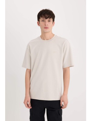 DeFacto Boxy Fit Bisiklet Yaka Ütü Gerektirmeyen Nefes Alabilen Baskılı Kısa Kollu Ağır Kumaş Tişört D5507AX25SP