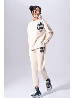 Kadın Regular Fit Bisiklet Yaka Uzun Kol Pamuklu Krem Pantolon NAAR91209-KREM