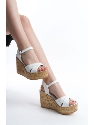 Limeo Çapraz Şeritli Yüksek Ahşap Görünümlü Taban Cilt Tokalı Yazlık Kadın Dolgu Taban Sandalet Ayakkabı