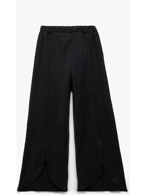 Koton Kız Çocuk Yırtmaç Detaylı Beli Lastikli Dokulu Palazzo Pantolon Polyester Karışımlı
