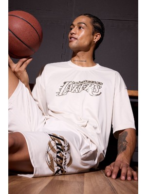 DeFacto NBA Los Angeles Lakers Oversize Geniş Kalıp Bisiklet Yaka Sırt Baskılı Kısa Kollu Tişört E0363AX25SP
