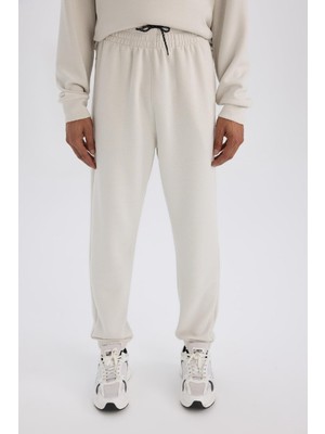 DeFacto Defactofit Standart Fit Sporcu Jogger Eşofman Altı Skuba Dalgıç Kumaş Beli Bağcıklı Lastikli PAÇA D7525AX25SP
