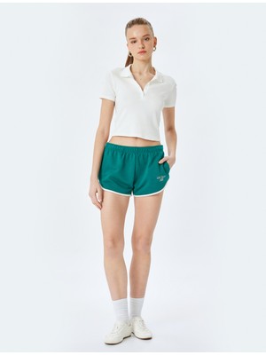 Koton Cep Detaylı Beli Lastikli Slogan Baskılı Biyeli Slim Fit Mini Şort