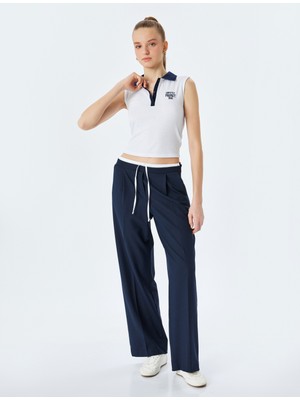 Koton Slim Fit Polo Yaka Kolsuz Kolej Işlemeli Üst