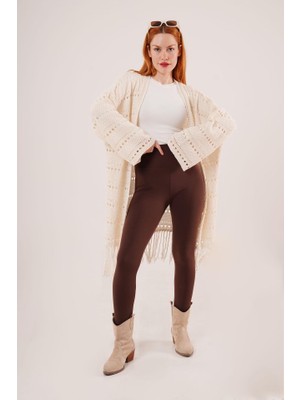 Gelirr Delikli Geçişli Püskül Detay Uzun Triko Krem Hırka