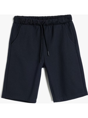 Koton Basic Beli Bağcıklı Cepli Şort Erkek Çocuk Desensiz Rahat Kesim Yazlık Tasarım