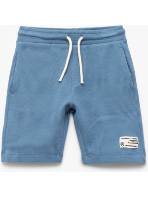 Koton Pamuklu Beli Bağlamalı Aplike Detaylı Cepli Şort