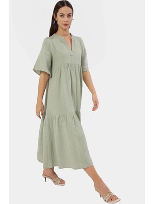 Rahat ve Şık Müslin Elbise Midi Boy Geniş Kesim %pamuk Kullanım