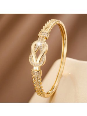 Kadın Gold Renk Taş Detaylı Örgü Form Bileklik – 5.5 cm Zarif Tasarım