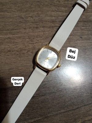 Marka Model Retro Still Vintage Oval Charmlı Gold Kasa  - Hakiki Deri Bej Kordon Kadın Kol Saati  0021